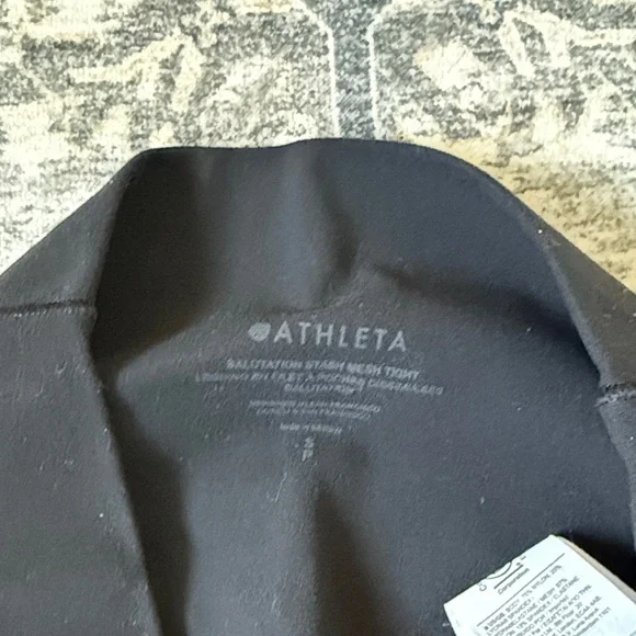 Athleta Black salutation stash pocket mesh panel. 7/8 Leggings - Picture 2 of 6